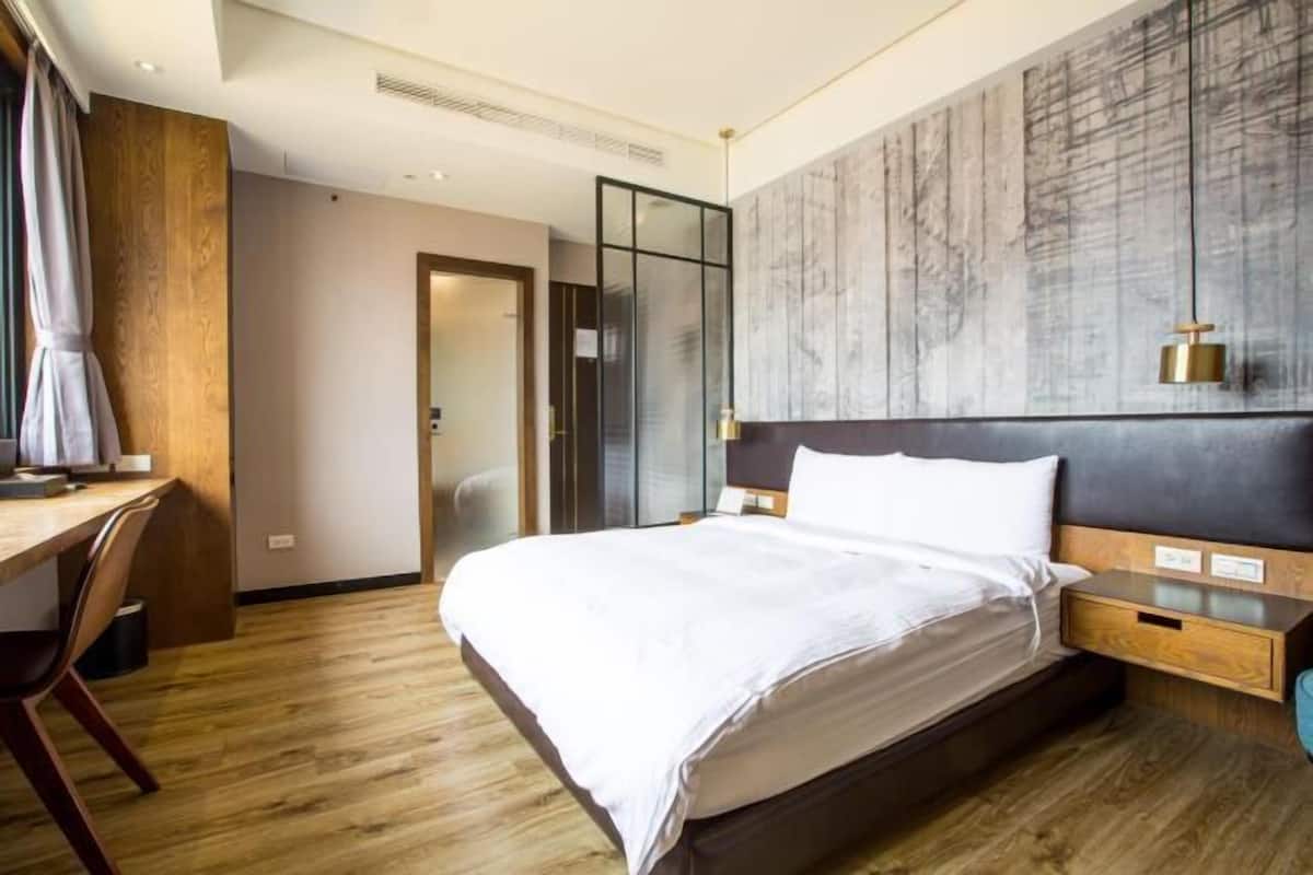 Down comforters, desk, WiFi (free), bed sheets