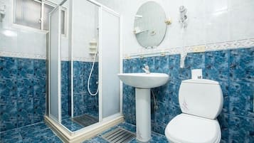 Double Room | Bathroom | Shower, hair dryer, slippers, towels
