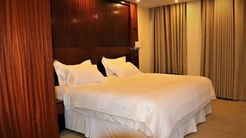 Deluxe Single Room | Minibar, desk, laptop workspace, blackout drapes