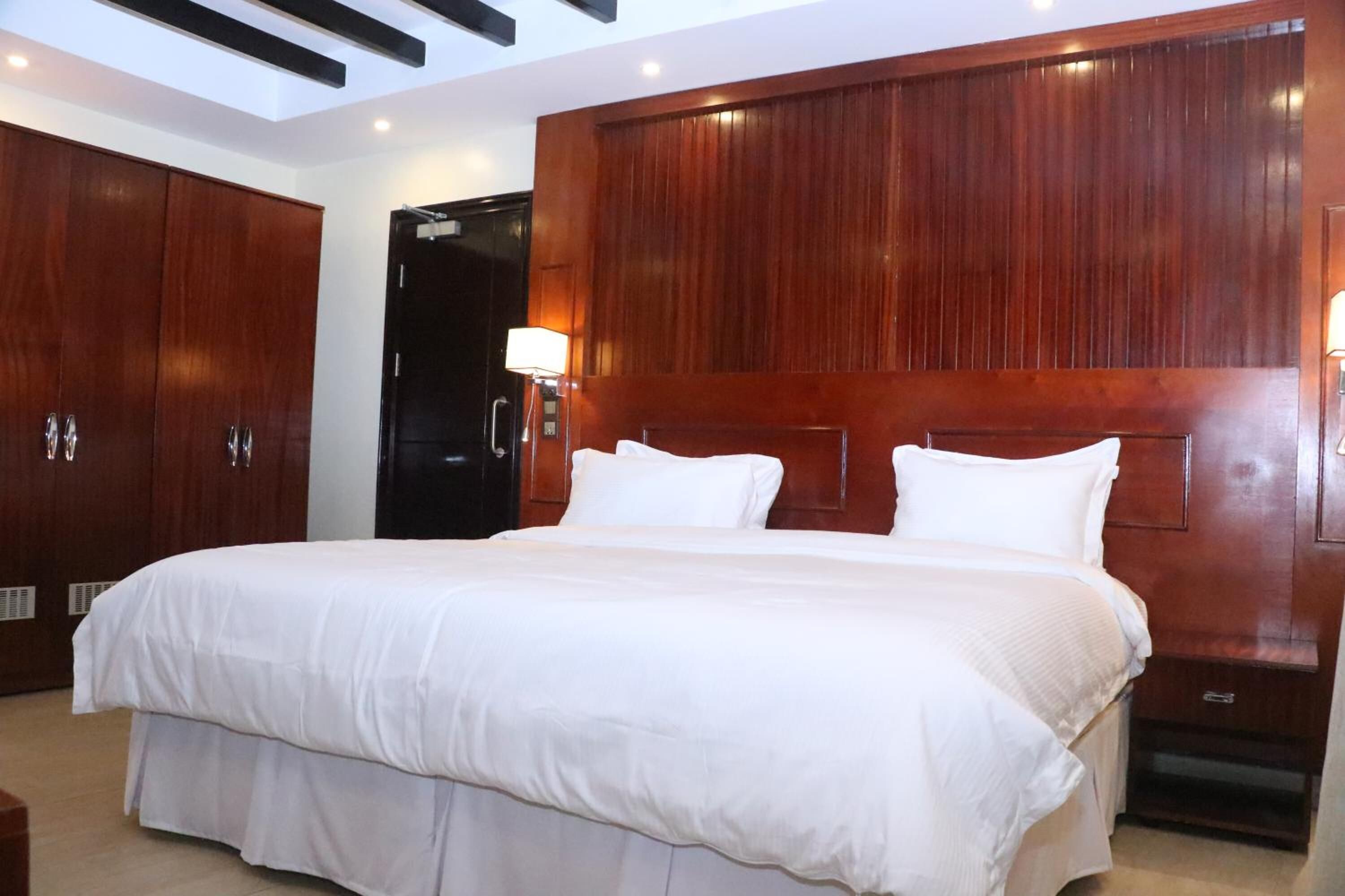 minibar, desk, laptop workspace, blackout curtains