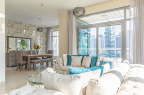 Deluxe Apartment, 2 Bedrooms | Living room | LCD TV - Nasma Luxury Stays - Park Island Blakely (Dubai)