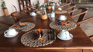 Breakfast, lunch, dinner served; local and international cuisine