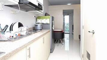 Apartment | Private kitchen | Fridge, microwave, stovetop, dishwasher