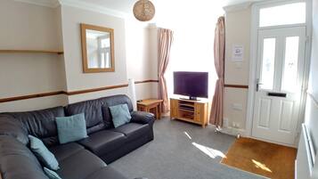 Rumah | Area keluarga | Televisi layar datar 30-inci dengan saluran TV digital dan TV