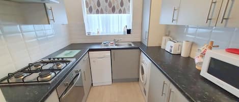 Apartment | Private kitchen | Fridge, microwave, oven, stovetop