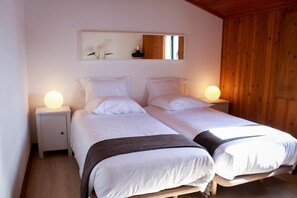 1 bedroom, desk, iron/ironing board, travel crib