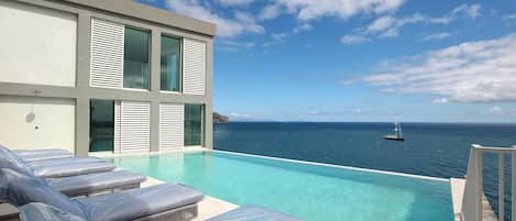 Outdoor pool, sun loungers