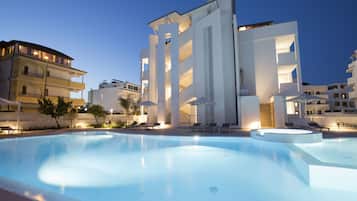 Seasonal outdoor pool, pool umbrellas, sun loungers