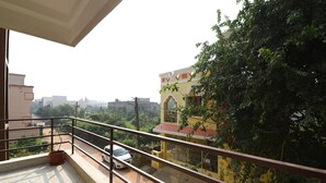 Standard Double Room | Balcony - OYO 24567 Spacious Stay Near Khandagiri Hills (Bhubaneshwar)