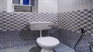 Standard Double Room | Bathroom | Shower, towels - OYO 30102 Luxurious (Bhubaneshwar)