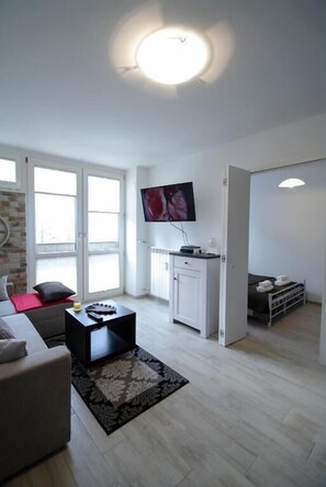 Suite monolocale City | Area soggiorno | TV
