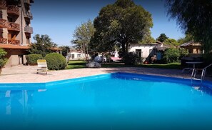 Seasonal outdoor pool, pool umbrellas