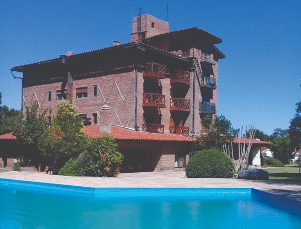 Seasonal outdoor pool, pool umbrellas