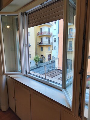 Apartamento superior | Vista para o pátio