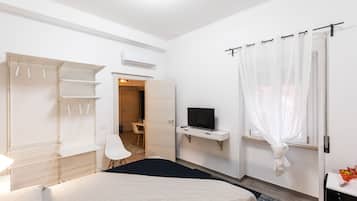 Family Suite | 1 bedroom, down comforters, minibar, individually furnished