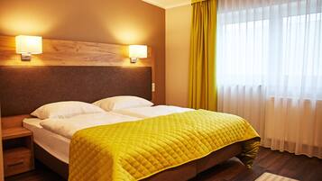 Premium bedding, pillowtop beds, in-room safe, individually furnished