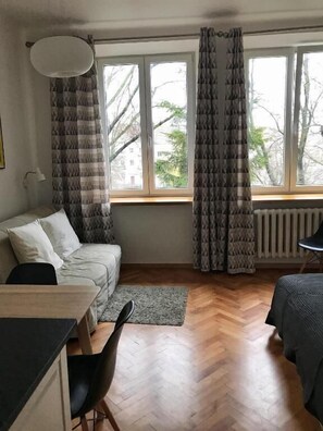 Suite estudio Confort | Sala de estar | Televisión