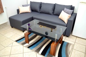 Deluxe Apartment | Living area | LCD TV