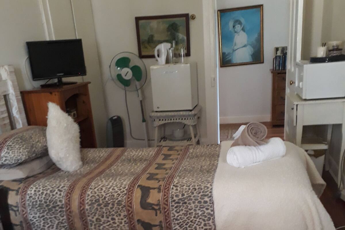 1 bedroom, desk, blackout drapes, iron/ironing board