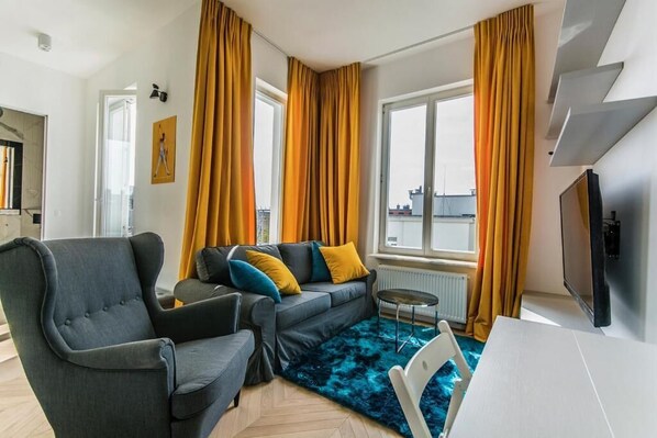 City Apartment | Living room | TV - Lion Cozy apartment on Targowa (Warsaw)