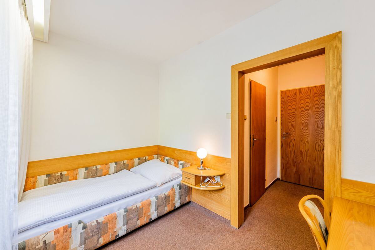 Desk, laptop workspace, free WiFi, bed sheets