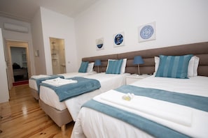 Premium Quadruple Room, Private Bathroom (7) | Blackout drapes, soundproofing, free WiFi, bed sheets - Inn - Chiado Boulevard Guest House (Lisbon)