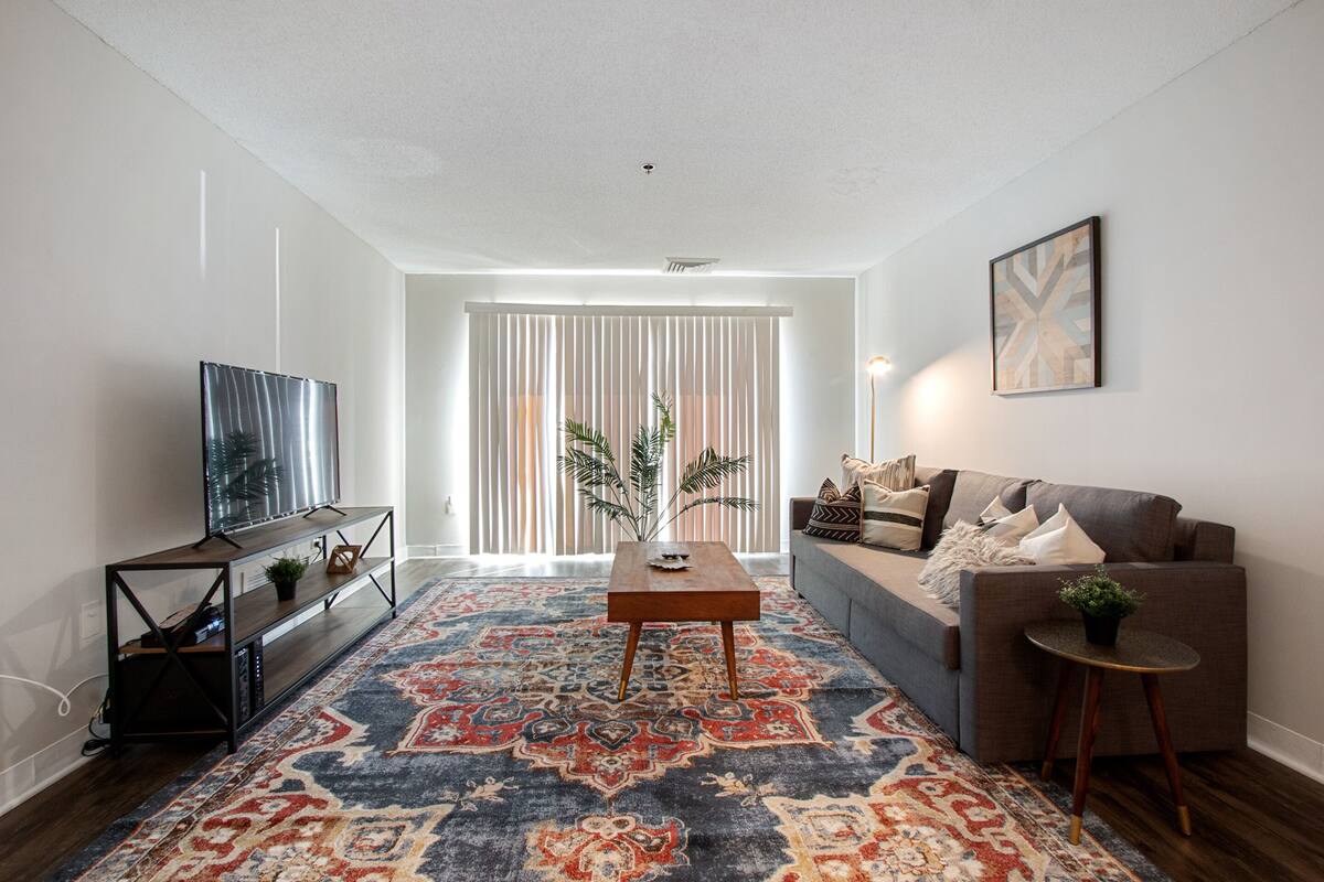 Exclusive Condo, 1 Bedroom | Living area | Flat-screen TV
