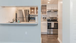 Deluxe Apartment, 1 Bedroom | Private kitchen | Coffee/tea maker, full-size fridge, microwave, oven - The Luxe Suites of Alexandria (Alexandria)