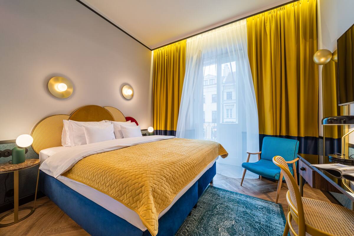 Superior Double Room, Balcony | In-room safe, desk, laptop workspace, blackout drapes