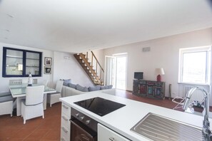 Apartment, 2 Bedrooms | Private kitchenette | Full-size fridge, oven, stovetop, cookware/dishes/utensils