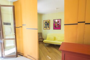 Apartment, 1 Bedroom | Living area | TV - Baia Fiorita (Porto Azzurro)