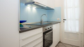 Apartment, 2 Bedrooms | Private kitchenette | Full-size fridge, stovetop, cookware/dishes/utensils - Miramare (Rio)