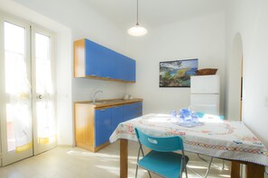 Apartment, 3 Bedrooms | Private kitchenette | Full-size fridge, oven, stovetop, cookware/dishes/utensils