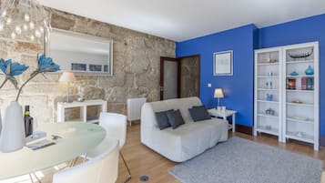 Standard Apartment, 2 Bedrooms, River View | Living room | 32-inch LCD TV with cable channels, TV