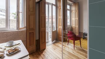 Design Studio, City View | Living area | 32-inch LCD TV with cable channels, TV