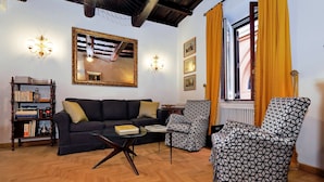 Apartment, 1 Bedroom (Via Vittoria) | Living area | 60-cm LCD TV with digital channels, TV - Via Vittoria - WR Apartments (Rome)