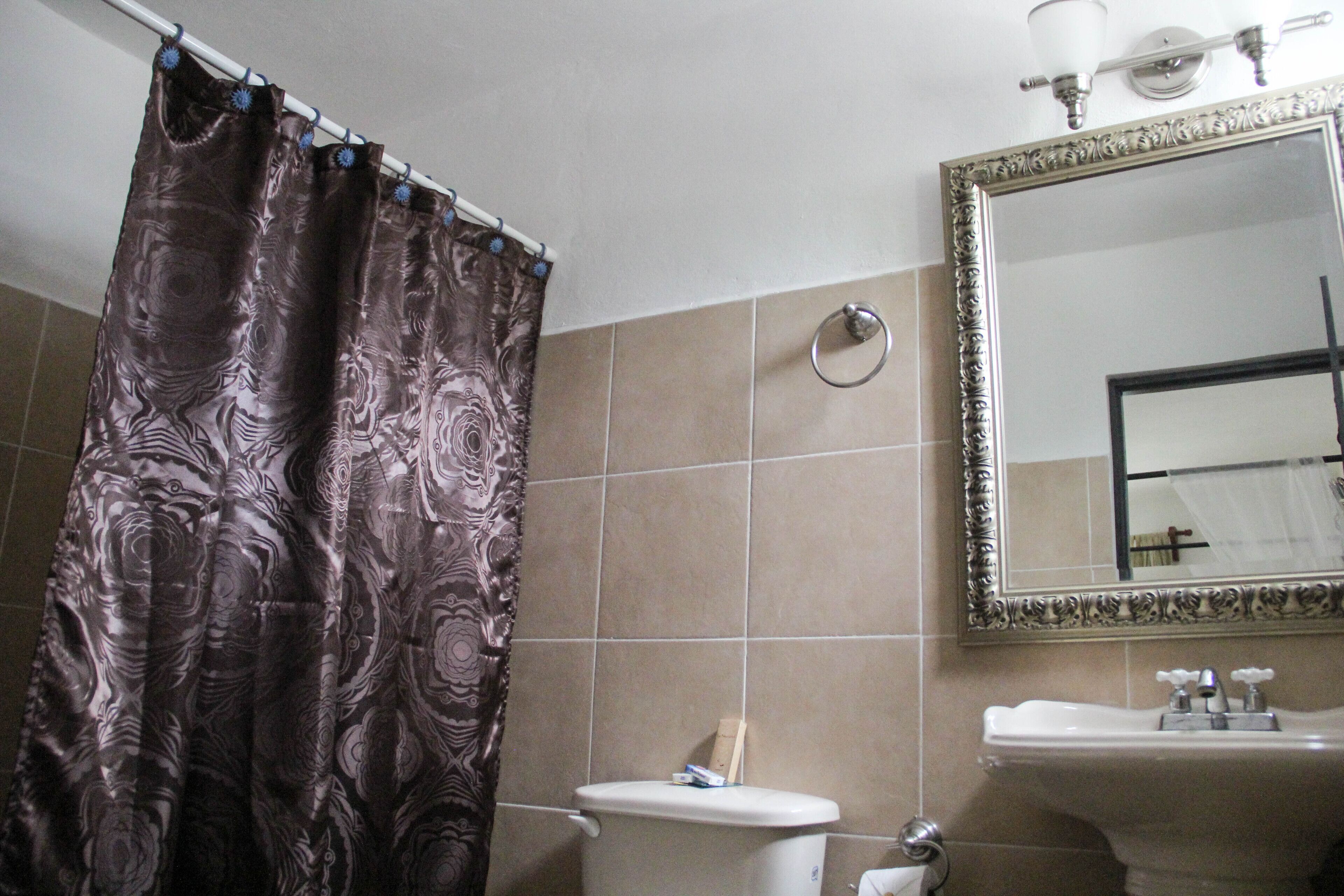 honeymoon studio suite, 1 bedroom, pool access, garden view | bathroom | shower, hair dryer, towels, soap