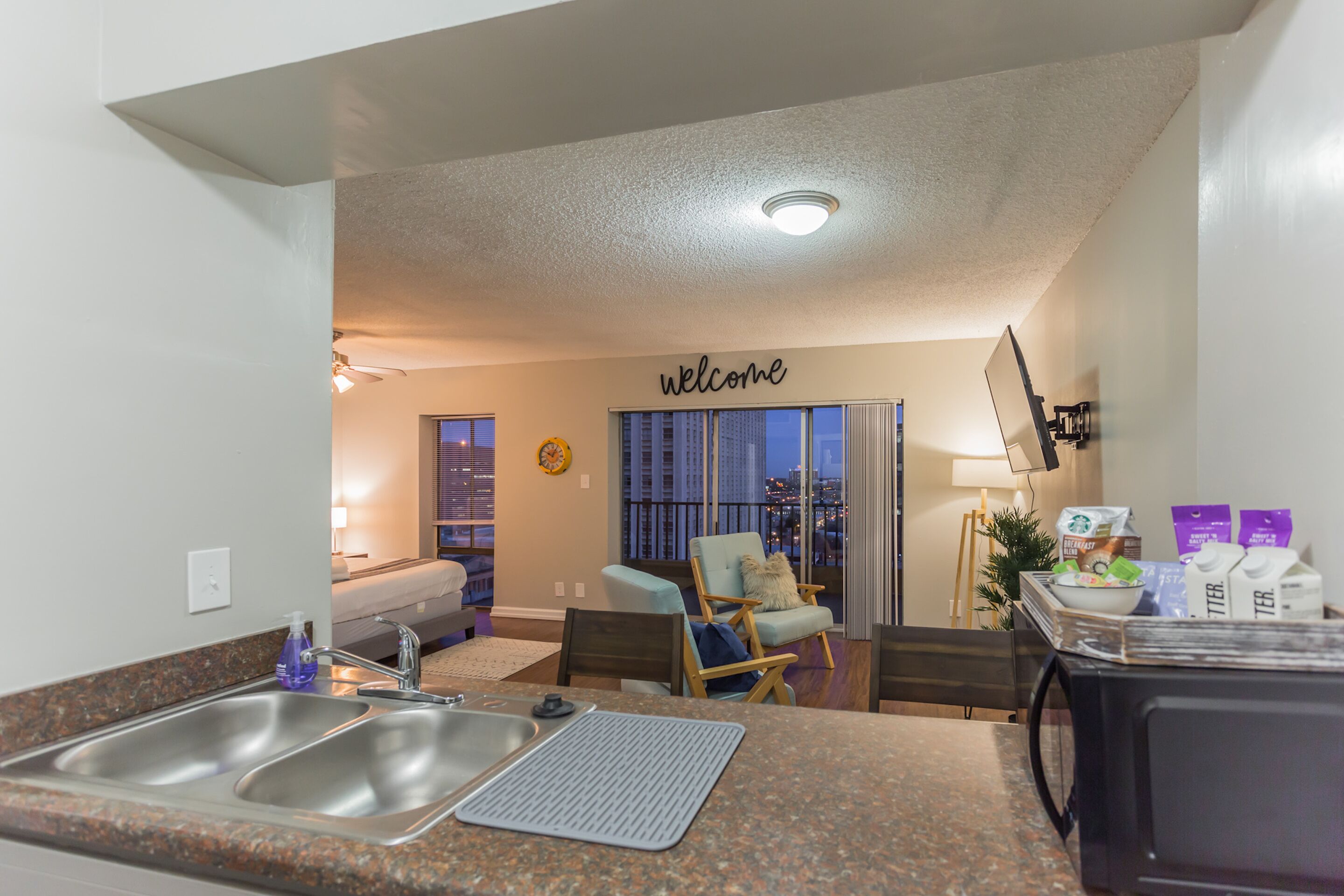 Studio, River View | Living area | Flat-screen TV