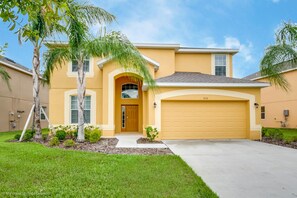 Enter through the large, arched doorway and step into a tropical oasis.