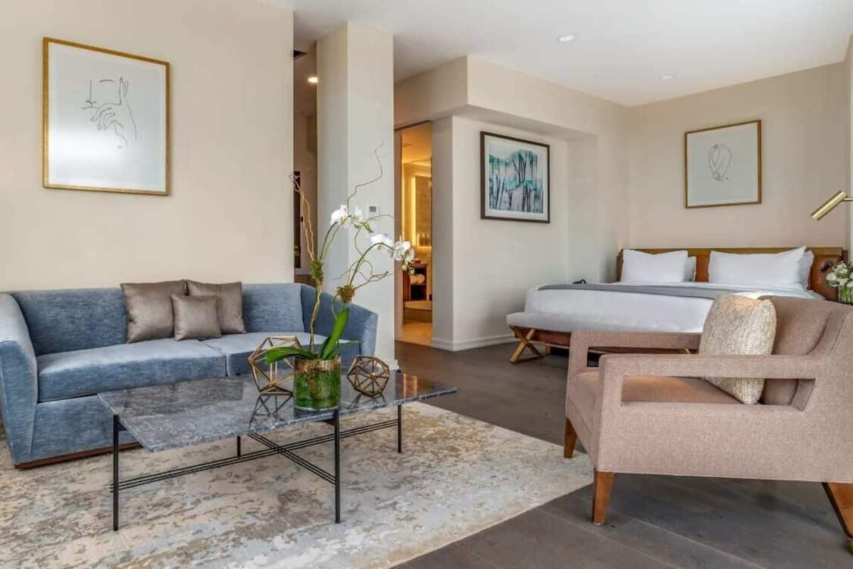 French Quarter Suite | Living area | Flat-screen TV