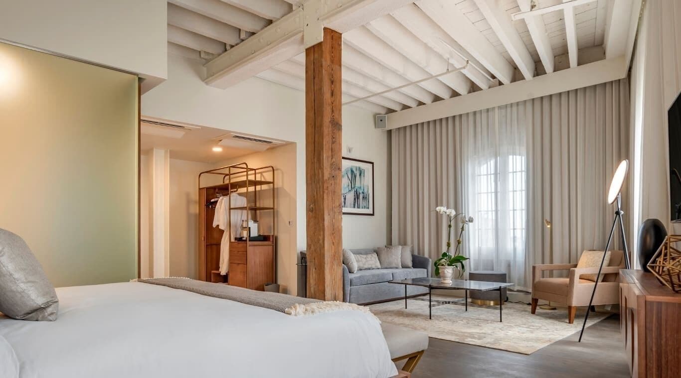 signature studio suite, 1 king bed, river view | premium bedding, pillow-top beds, in-room safe, laptop workspace