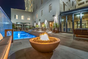 Outdoor pool, open 9:00 AM to 9:00 PM, sun loungers