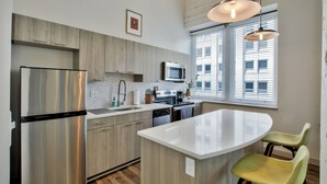 Classic Apartment, 1 Queen Bed | In-room dining - The Old Town Luxury Lofts (Wichita)