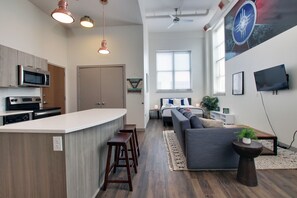 Classic Loft, 1 Queen Bed | Living room | Flat-screen TV - The Old Town Luxury Lofts (Wichita)