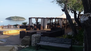 Private beach nearby, black sand, beach shuttle, beach umbrellas