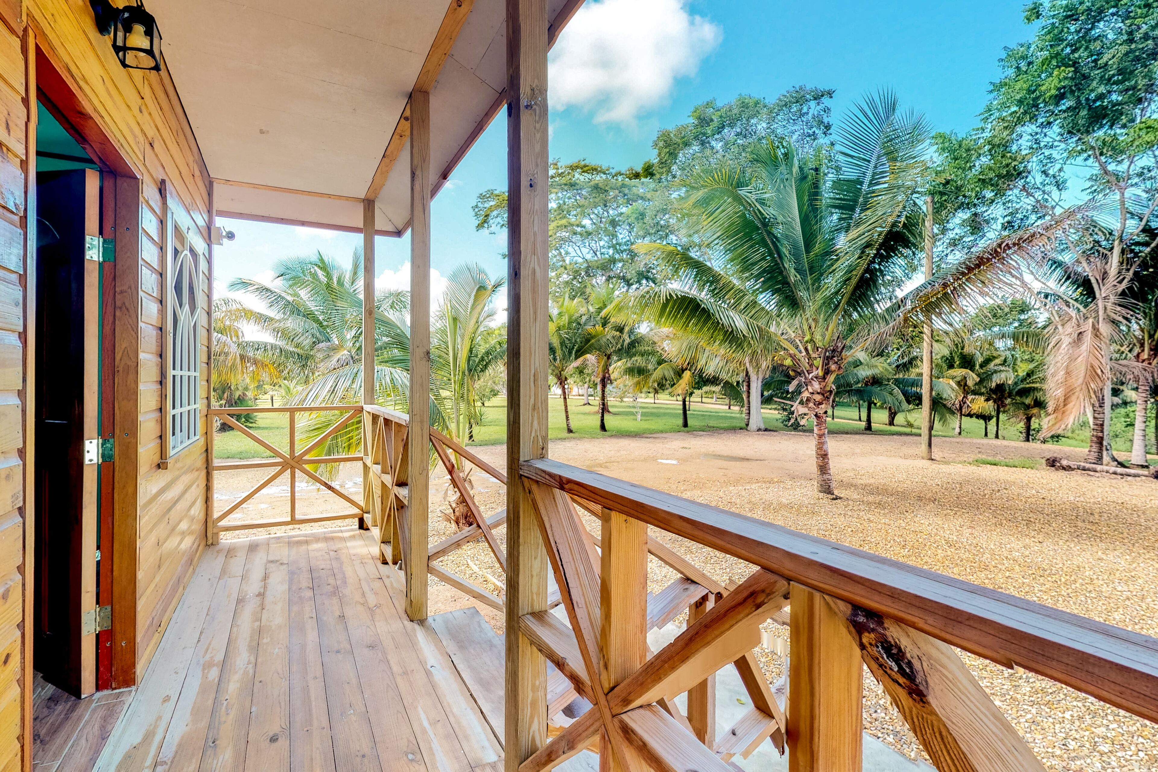 Tropical cabana outside Dangriga - quiet & secure w\/ free WiFi, TV & partial AC