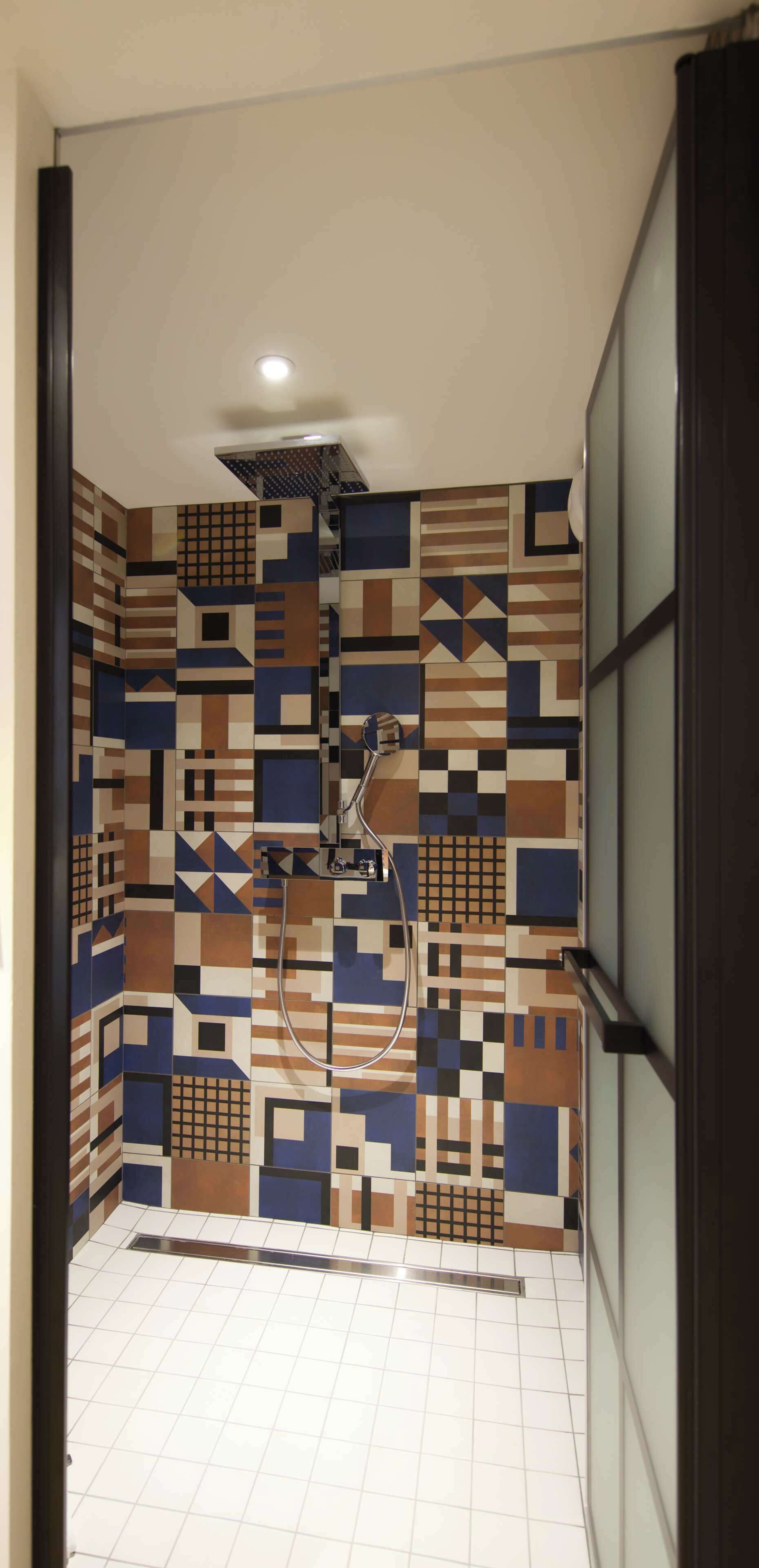 executive room, 1 king bed | bathroom | rainfall showerhead, eco-friendly toiletries, hair dryer, towels