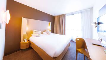 Premium bedding, individually furnished, desk, laptop workspace