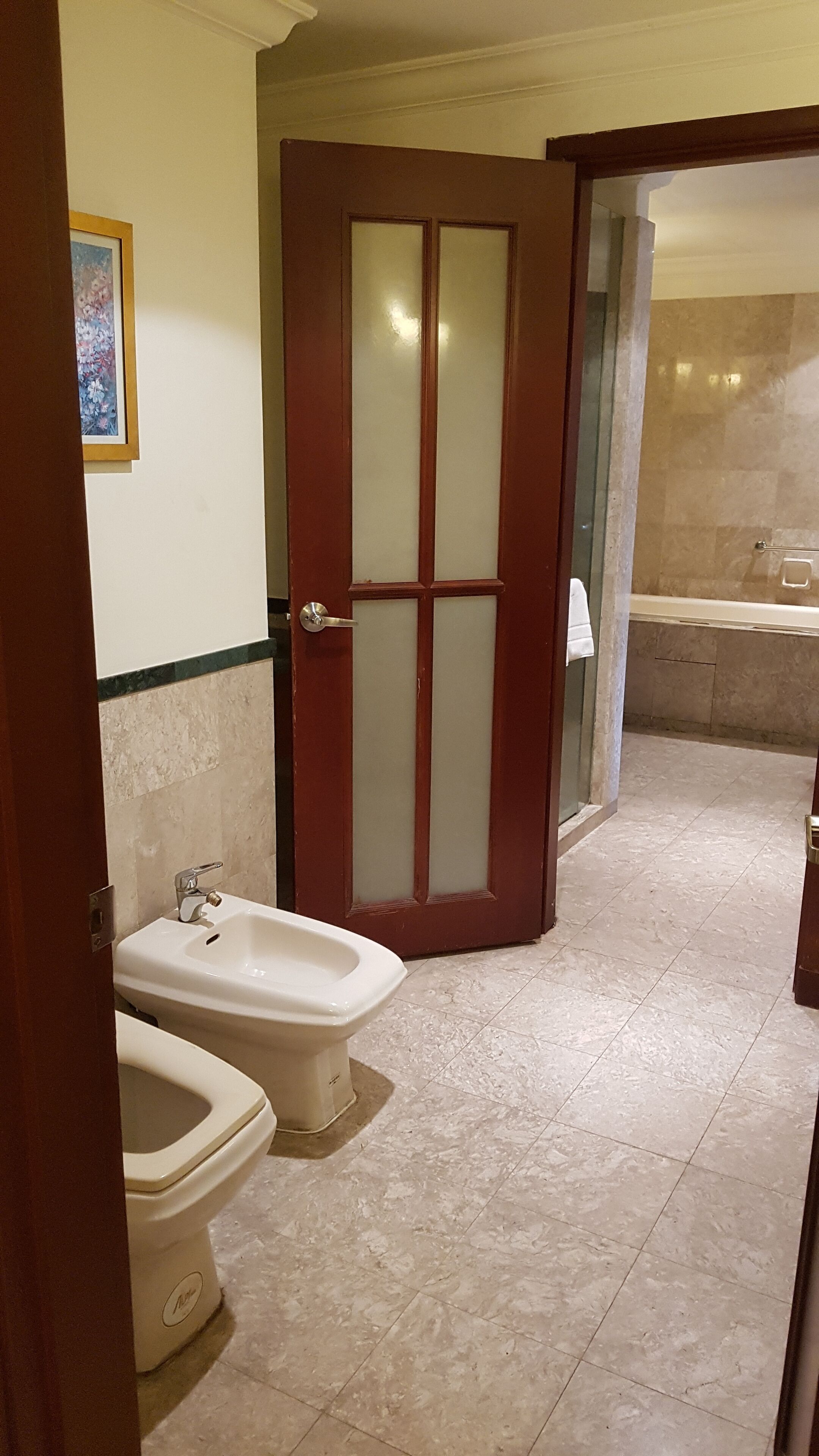Bathroom | Separate bathtub and shower, hair dryer, slippers, towels