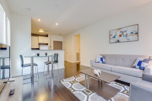 Apartment | Living area - Peachtree Apartments by Avalon Suites (Atlanta)